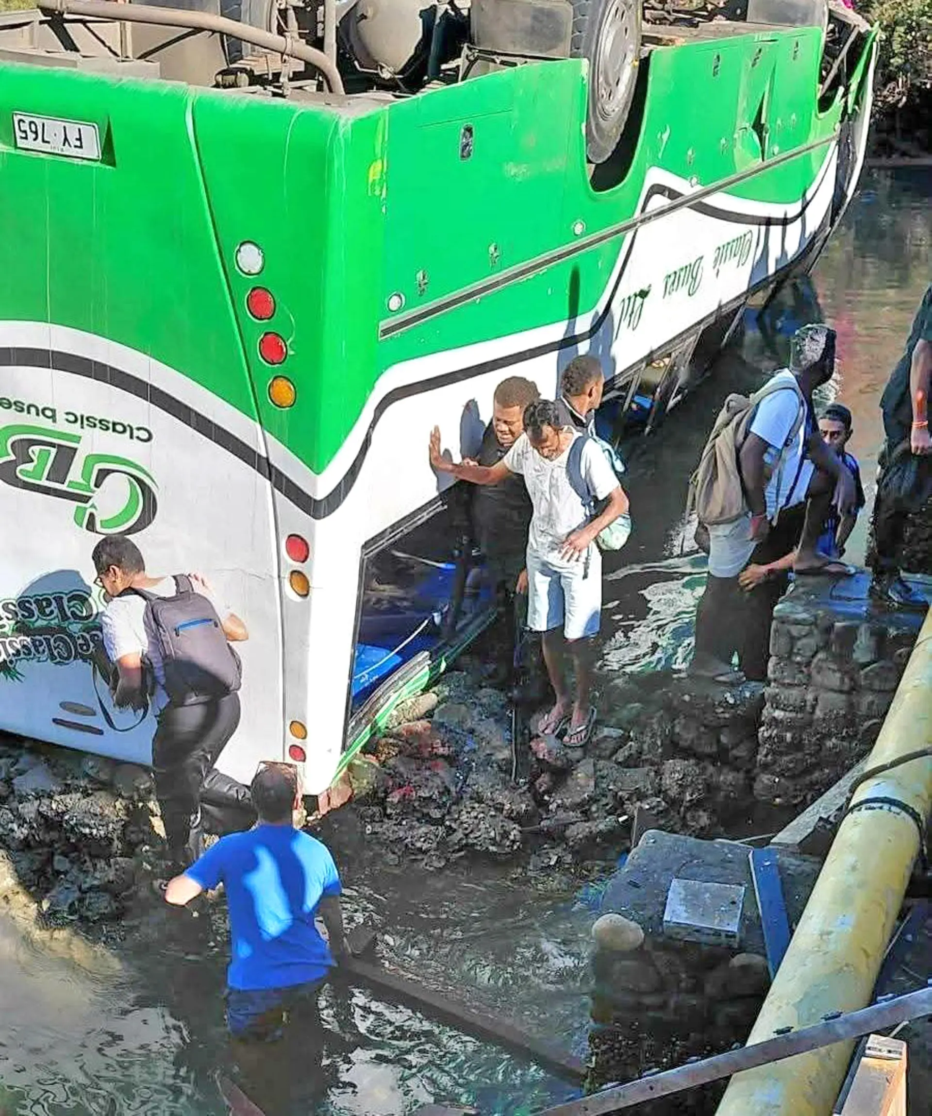 The Classic Bus lying on its roof following an incident at Denarau Monday morning.  