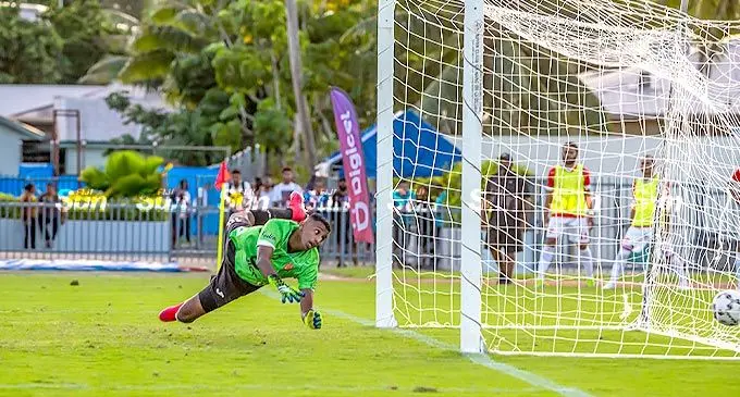 Glamada Investments Rewa goalkeeper Mohammed Alam fails to stop a classic strike from 4R Electrical Labasa striker Christopher Wasasala in their Digicel Fiji FACT clash at the ANZ Stadium, Suva, on May 22, 2022. Labasa won 2-1. Photo: Leon Lord.