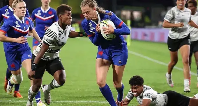 Rooster Chicken Fijiana XVs halfback Lavena Cavuru comes in to make a tackle against France while Rusila Nagasau is on the ground on October 22, 2022. Photo: World Rugby