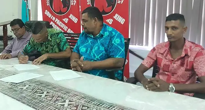 From left: Boxing Commission of Fiji chairman Adi Narayan, Ubaydullah Haider signs contract to with South Pacific Boxing Promotions promoter Fred Chand and Krishnil Mudaliar in Suva on April 5, 2024. Photo: Leone Cabenatabua   