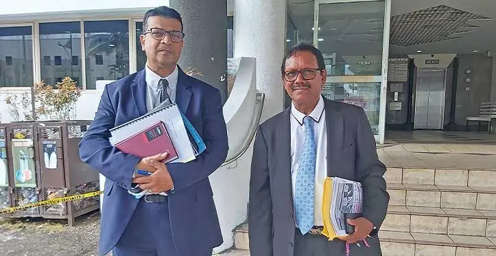Former Fijian Electoral Commission chairperson Suresh Chandra (right) with his lawyer Devanesh Sharma outside Independent Legal Services Commission in Suva on March 21, 2023. Photo: Ashna Kumar