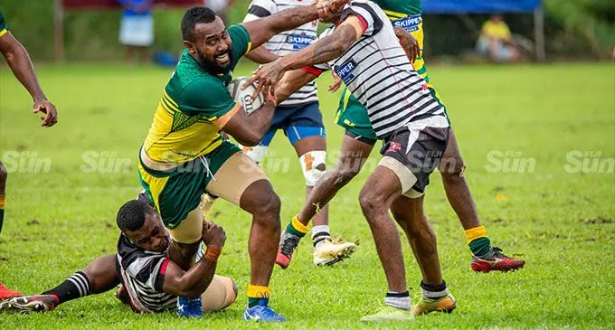 Tailevu No.8 Keresoni Delainuna (with ball) cuts through the Rewa defence during their Skipper Fiji Rugby Championship match at the Nakelo District School on June 25, 2022. Photo: Leon Lord