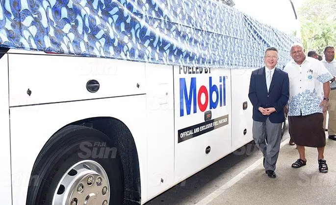 Chinese Ambassador to Fiji Qian Bo (left) Prime Minister Voreqe Bainimarama during the handing over of two bus Fiji Rugby Union on May 21, 2020. Photo: Ronald Kumar.