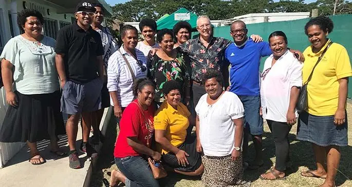 Hilton Fiji Beach Resort and Spa area general manager David Wells (standing fourth from right), with some staff members who turned up.