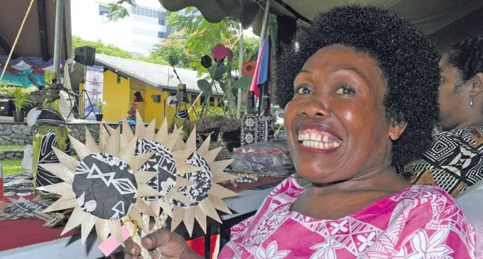 Lusiana Buli 56, of Rewa Disable Women's group with some of her hanicraft on sale during Central Division Women's Craft Show in Ratu Sukuna Park on March 01, 2018. Photo: Ronald Kumar.
