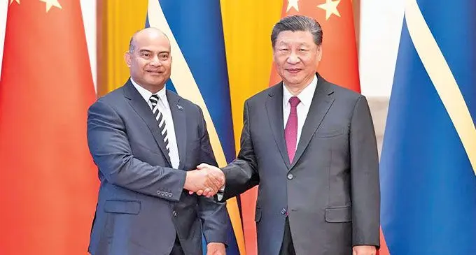 China’s President Xi Jinping (right) holds a welcome ceremony for Nauru President David Adeang in the Northern Hall of the Great Hall of the People prior to their talks in Beijing, capital of China, on March 25, 2024. Photo: Xinhua