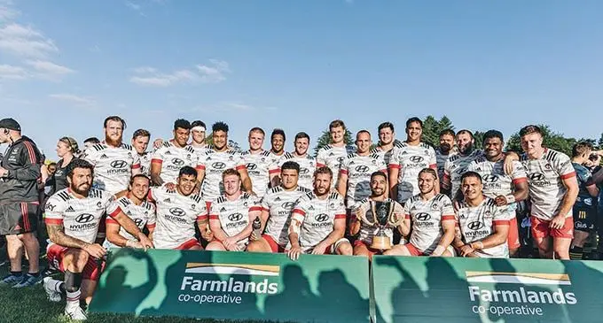 Crusaders with Timoci Tavatavanawai (standing second from right) pose with the Farmlands Cup after beating the Highlanders 28-26 at the Temuka Rugby Footbal Club on February 12, 2021.  Photo: Crusaders
