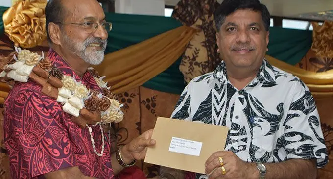 Gurbachan Singh Memorial Trust chairman and trustee Charan Jeath Singh (right) handover donation to University of the South Pacific vice chancellor and president Professor Rajesh Chandra during the opening of USP Pacific Technical and Further Education at Gurbachan Mall in Labasa on February 2. Photo:Shratika Naidu