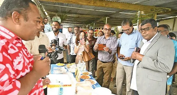 Minister for Agriculture, Waterways and Environment Mahendra Reddy (right) with participants and stakeholders at the Local Food Fair event in Koronivia Research Station on October 18, 2022. Photo: Ministry of Agriculture, Waterways and Environment
