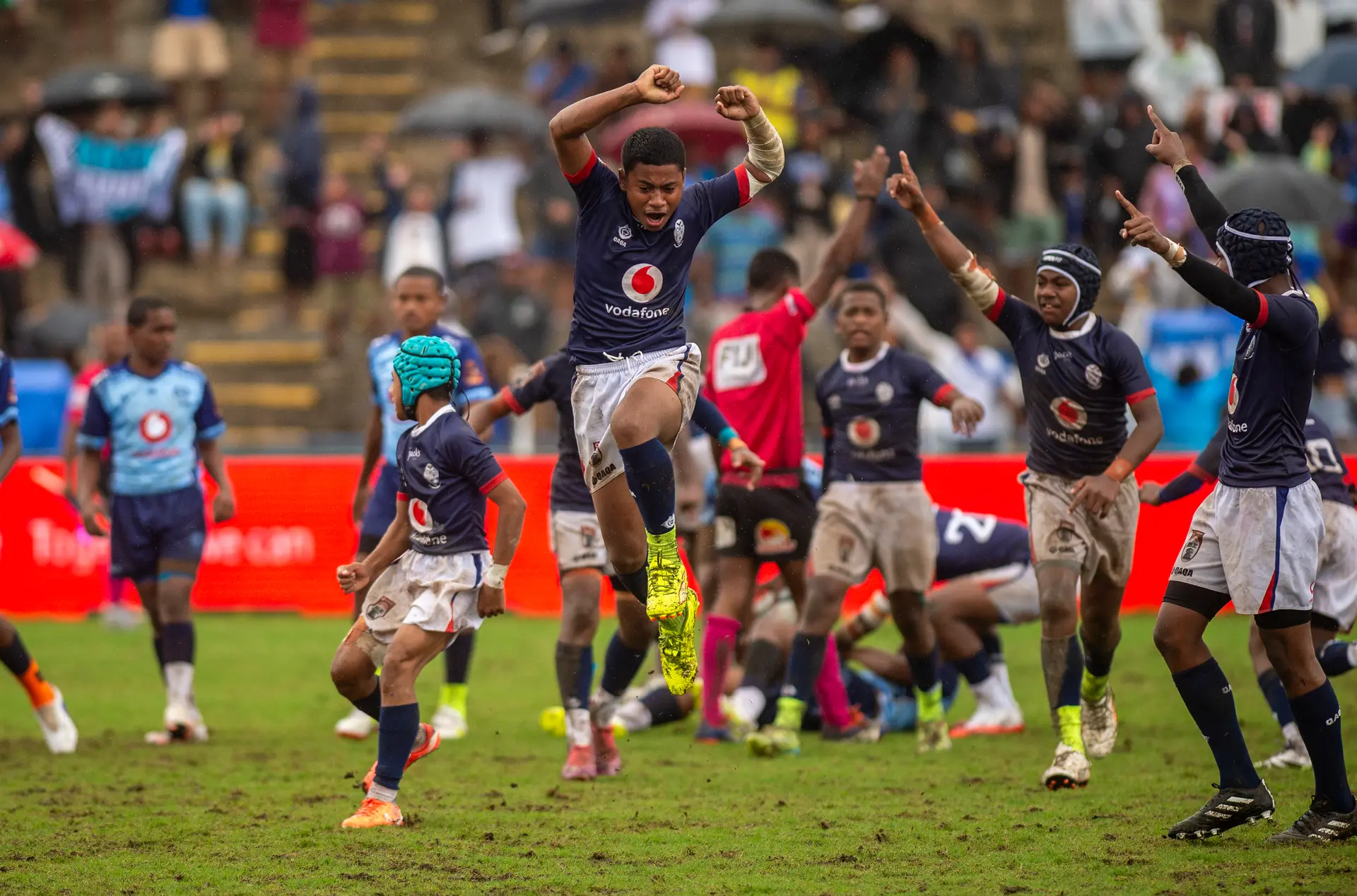 Jubilation, relief and raw emotion as Ratu Navula College players celebrate their 22–17 victory over Queen Victoria School to claim the Vodafone Super Deans Under-14 title.