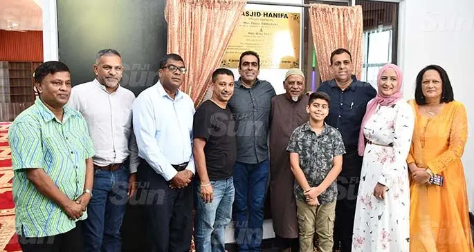 From left: Acting Chief Justice, Kamal Kumar, Minister for Commerce, Trade Tourism and Transport Faiyaz Koya, Minister for AgricultureWaterways and Environment Mahendra Reddy, and Minister for Education, Heritage and Arts Rosy Akbar (right) with Azrpena Khan (2nd from right) her husband Bobby khan (third from right) and family members at the new Masjid Hanifa at Nadovi in Nadi. Photo: Mereleki Nai