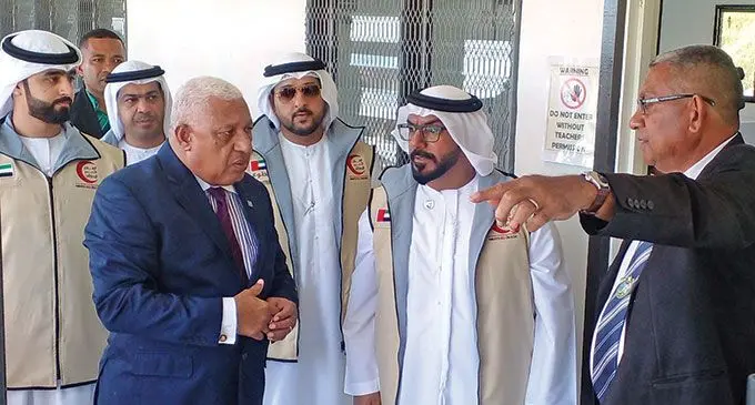 Muaira Methodist College Manager Albert Wise (right), Prime Minister Voreqe Bainimarama and The Red Crescent Society of the UAE  Deputy Secretary General for Marketing and Resource Development Affairs Hamoud Aljounaibi (second from right), with his delegation, Government officials and other guests. Photo: Salote Qalubau