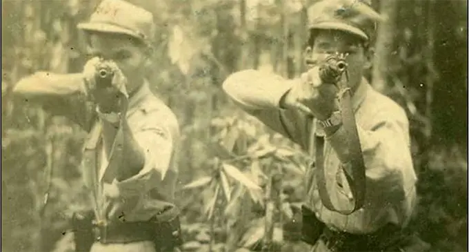 Communist terrorists in Malaya.