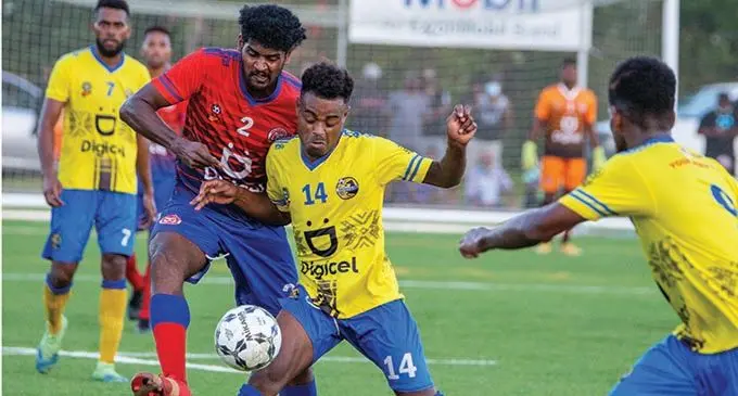 Nadroga defender and captain Tomasi Tuicakau shields the ball away from Navua striker Zainal Ali during their Digicel Premier League clash at the Uprising Sports Centre in Pacific Harbour, Deuba, on October 24, 2021. Photo: Leon Lord.  