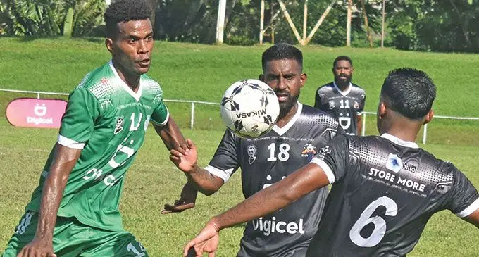Nadi’s Sekove Finau (left) defends against Ba in the Digicel Premier League clash at Prince Charles Park in Nadi on March 27, 2022. Photo: Waisea Nasokia.