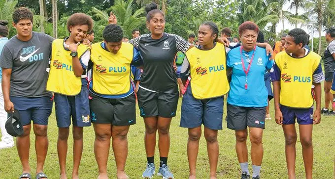 Rooster Chicken Fijiana Drua prop Joma Rubuti and captain Bitila Tawake (fourth from left) with Getting into Rugby (GiR) and Rugby Plus programme participants that was attended by the Australia’s Sports Diplomacy Advisory Council chair Stepahnie Brantz at the Latter-day Saints College in Tamavua, Suva, on May 13, 2022. Photo: High Commission of Australia.