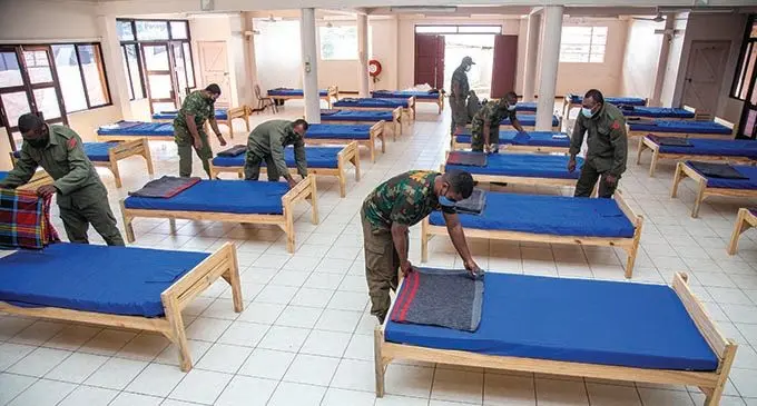 ALL SET FOR BIG COVID-19 SURGE... Republic of the  Military Forces personnel set up beds on July 8, 2021 at the Patel Samaj Hall in Toorak, Suva, as they prepare for the influx of COVID-19 patients.   Photo: Leon Lord