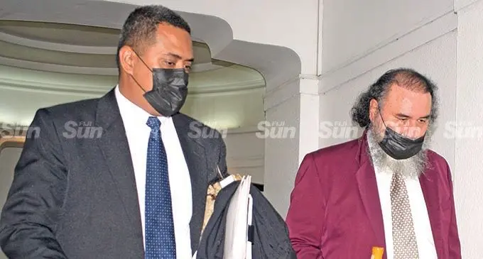 John Samisoni (right) with lawyer Vilisoni Filipe outside Court in Suva on February 8, 2022.  Photo: Ronald Kumar