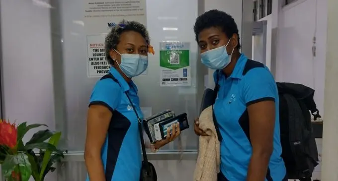 Queensland bound....Fijian Pearls squad members Unaisi Rauluni (left) and Ema Mualuvu at Nausori International Airport on January 28, 2022. Photo: Netball Fiji