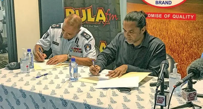 Commissioner of Police, Brigadier General Sitiveni Qiliho (left) and Fijian Broadcasting Corporation chief executive officer Riyaz Sayed-Khaiyum during the signing of the Memorandum of Understanding of the 2021 FMF Sukuna Bowl official partnership for television and radio on November 10, 2021. Photo: Kelera Sovasiga