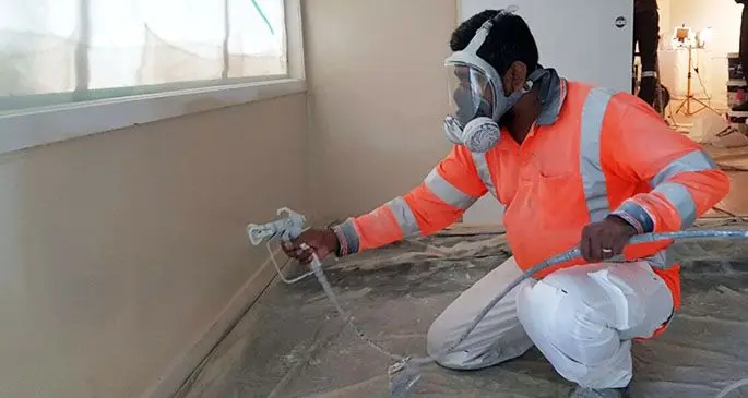 Mohammad Qaiyum Ali carrying out airless spraying at one of his client’s houses on April 12, 2021.