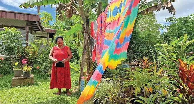 Florist Sainiana Tinai in her backyard. Photo: UNCDF/UNDP