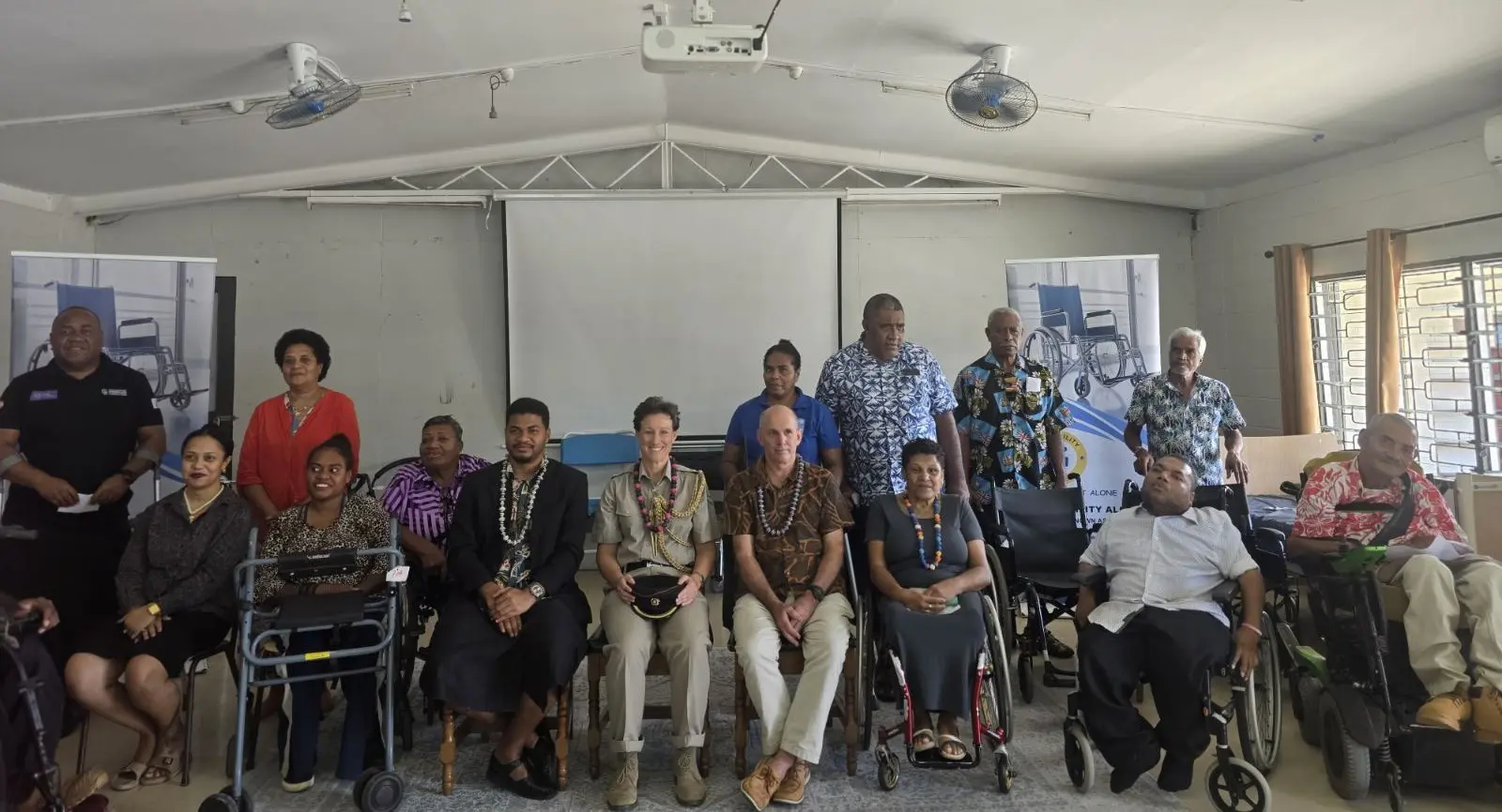 Sitting from the left: Luisa Taufa, Bulou Lavenia, Don Ravulo ( Vodafone representative), Lieutenant Colonel Sophie Waters (UK Defence Advise), Christopher Thompson (PhysioNet UK) with the staff during the handover ceremony at NCDP Complex in Suva on May 12, 2026.