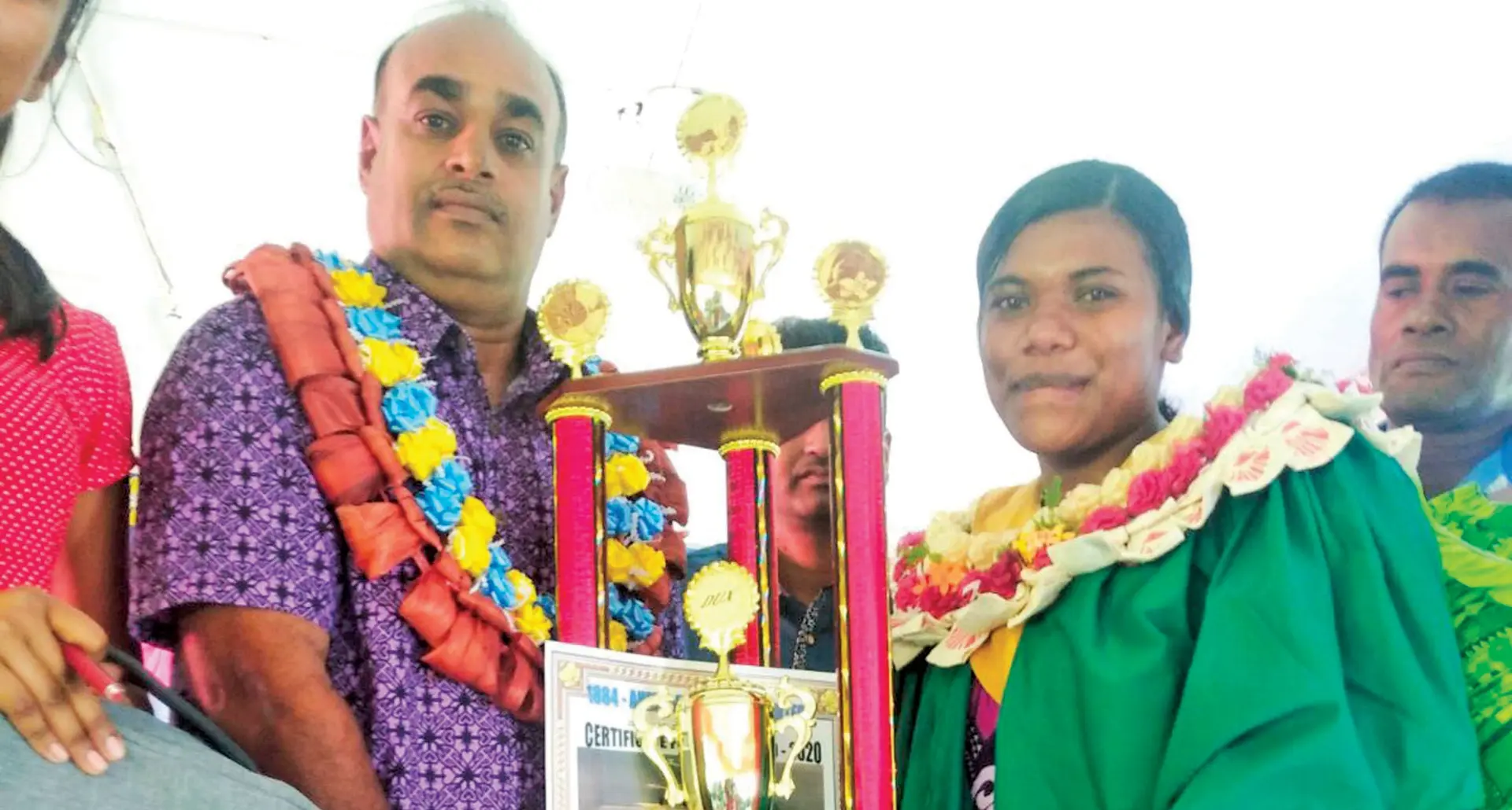 Ahmadiyya Muslim College prizegiving ceremony chief guest Bayly Trust manager Northern Satishwar Chand (left) with dux Eseta Matai Vanua in Voloca, Dreketi on December 3, 2020.