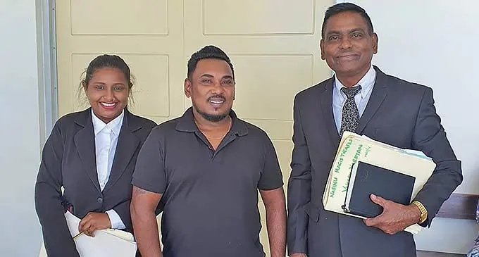 Vikash Narayan (middle) with his lawyers Jitend Reddy (right) and Sonika Naidu from Jitend Reddy Lawyers at the Magistrates Court in Nasinu on November 22, 2022.
