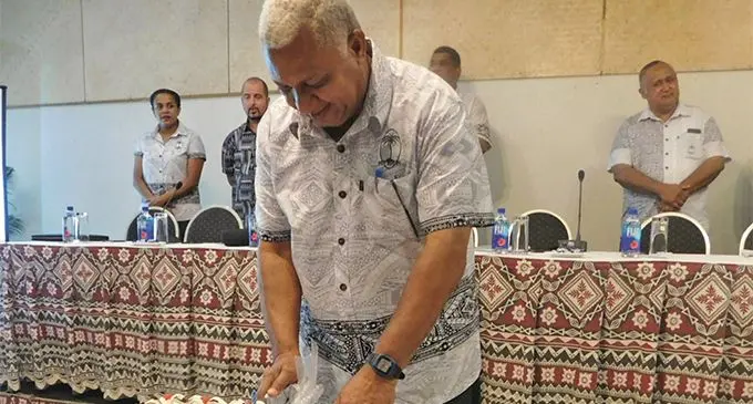 Prime Minister and Fiji Rugby Union president Voreqe Bainimarama cuts his birthday cake during the FRU annual general meeting at the Novotel Suva Lami Bay on April 27, 2019. Photo: FRU Media