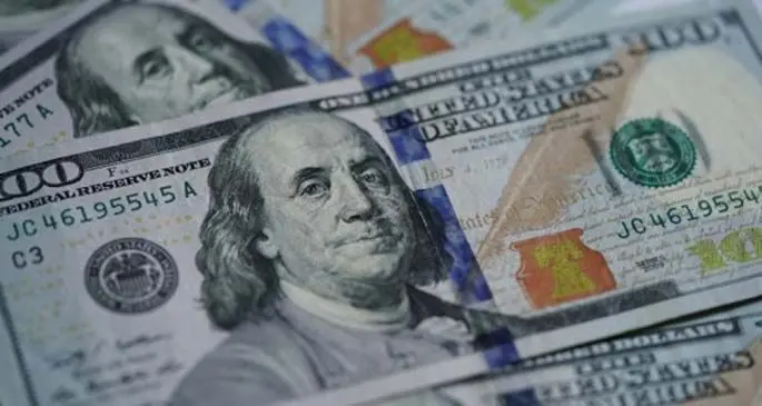 Photo taken on March 17, 2020 shows U.S. dollar banknotes in Washington, D.C., the United States. (Xinhua/Liu Jie)
