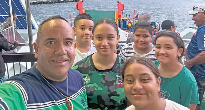 A selfie of the Traill family on a boat together.