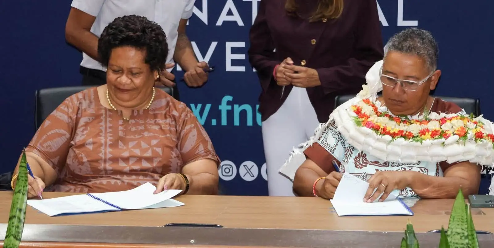 Fiji National Univesity vice-chancellor Professor Unaisi Nabobo-Baba with Unit Trust Of Fiji chairperson Lavinia Kaumaitotoya during the signing yesterday.