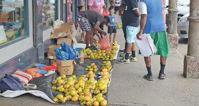 People still use the footpath to sell their produce despite advice by the Suva City Council that this is prohibited under the Local Government by-laws.   Photo: Ronald Kumar