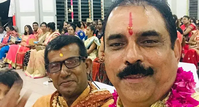 From left:  Northern Air chief executive officer Captain Rainjesh San with Pundit Ashok Maharaj.