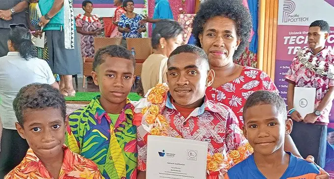 Qenika Ravula holding certificate with his mother, Mere Naidole and siblings Aliki Bia, Joape Rakawai and Ilitomasi Basa during the Pacific Polytech graduation in Labasa on December 18, 2024. Photo: Shratika Naidu