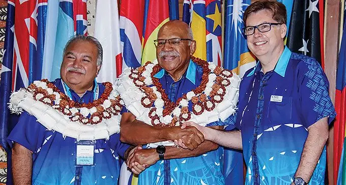 From left: Pacific Islands Forum Secretary-General Baron Waqa, Prime Minister Sitiveni Rabuka and Director Pacific Security College Professor Dave Peebles at the Pacific Islands Forum Secretariat in Suva in Suva on June 24, 2024.Photo: Pacific Security College