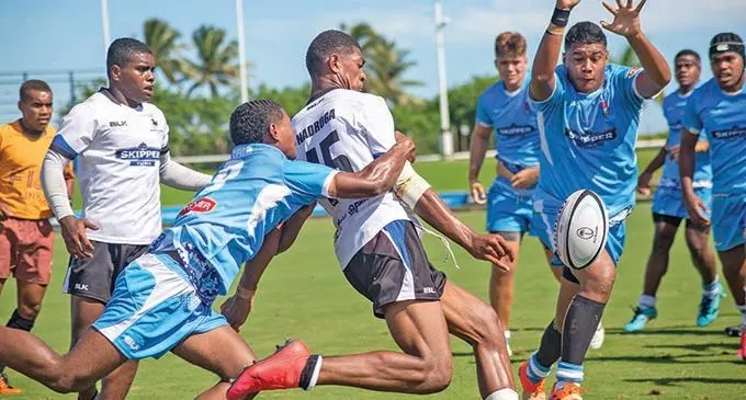 Nadroga Under-19 fullback Jonasa Kunaika’s clearance is foiled by Suva players  during their Skipper Provincial Cup U19 clash at the Suva’s ANZ Stadium on April 10, 2021. Photo: Leon Lord