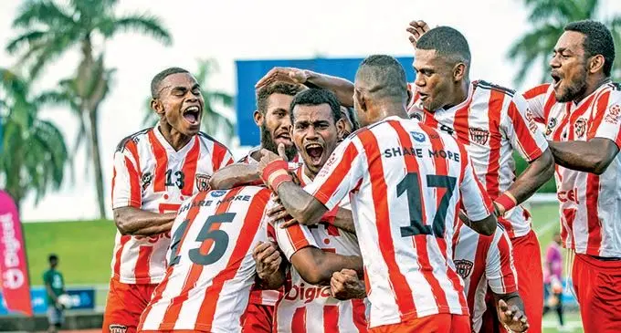 Labasa players, from left, Apenisa Anare, Marlon Tahioa and Akeimi Ralulu celebrate with teammates after they beat Suva 1-0, at ANZ Stadium on April 18, 2021. They missed the last three rounds of the Digicel Premier League as inter-island borders were still closed and will be travelling to Suva tomorrow to face Rewa at the ANZ Stadium. Photo: Leon Lord