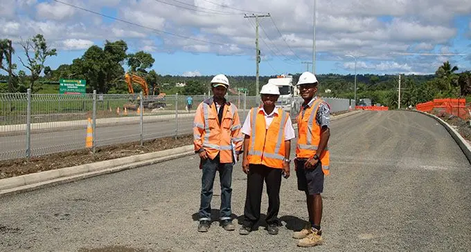 From left; Higgins’ Sagar Narsey with Fiji Roads Authority staff Johari Abdullah and Aisake Radu at the site. Photo: Fiji Roads Authority