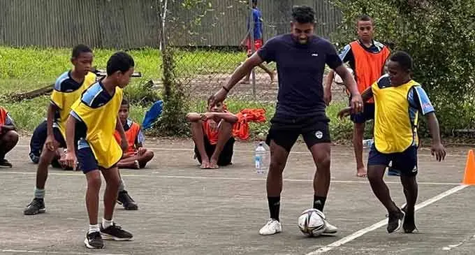 Roy Krishna shows how it is done with young footballers. Photo: OFC Media  