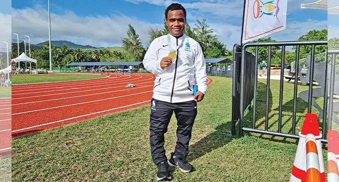 Team Fiji’s Iosefo Rakesa shows his gold medal during the Pacific Mini Games in Saipan on June 24, 2022. Photo: FASANOC