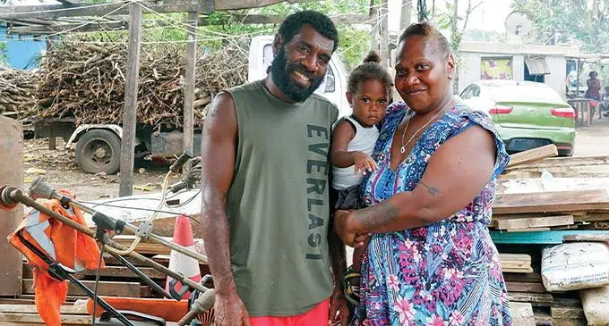 Frederica Atavi (right) with her son and husband Tom, feels the post-cyclone response has been slow. Photo: RNZ
