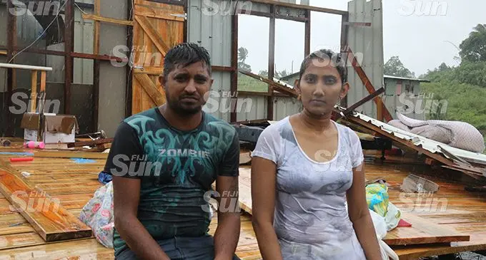 Shelvin Ram and Jyotishna Sharma outside the remains of their home in Narere. Photo: Wati Talebula