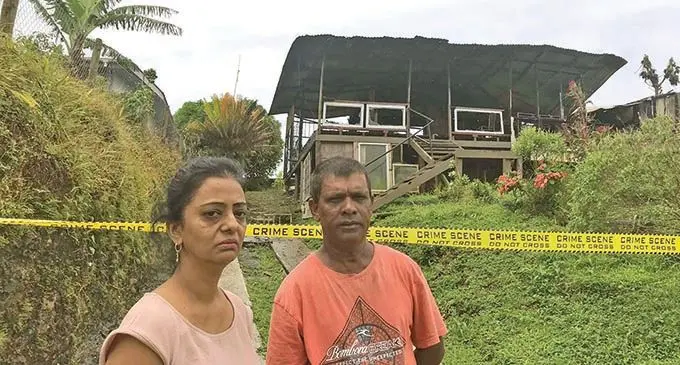 Reshmi Lata and her husband Jagdish Chand stand outside of the remains of their home in Ralagi Road, Valelevu on March 15, 2021. Photo: Inoke Rabonu