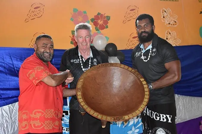 Tui Namosi Ratu Suliano Matanitobua (left)  presents a tanoa to Fiji Airways Flying Fijians head coach John McKee and captain Dominiko Waqaniburotu at Namuamua, Namosi on August 21, 2019. Photo: FRU Media