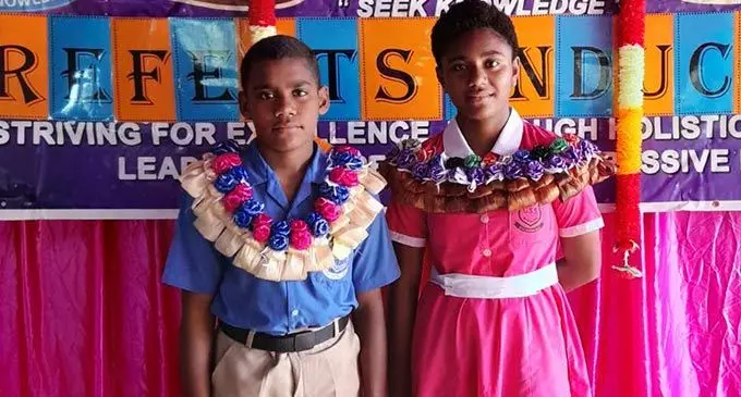 Gram Sangathan School head boy, Jekope Rasaubale and head girl Alumeci Qele after their prefect induction ceremony on May 10, 2022. Photo: Alumeci Qele’s family