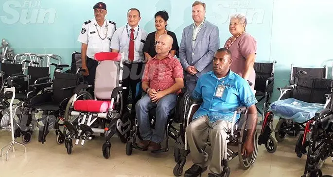 Standing from left: ASP Randhir Prasad, Director Social Welfare Rupeni Fatiaki, Vodafone ATH Fiji Foundation executive Ambalika Kutty, British High Commission Suva Head of Policy and Multilateral Dominic Rhodes and Anglican Church of Fiji representative Reverend Amy Chambers. Seated front from left: Spinal Injury Association of Fiji executive director Joshko Wakaniyasi and Pauliasi Seru. Photo: Inoke Rabonu