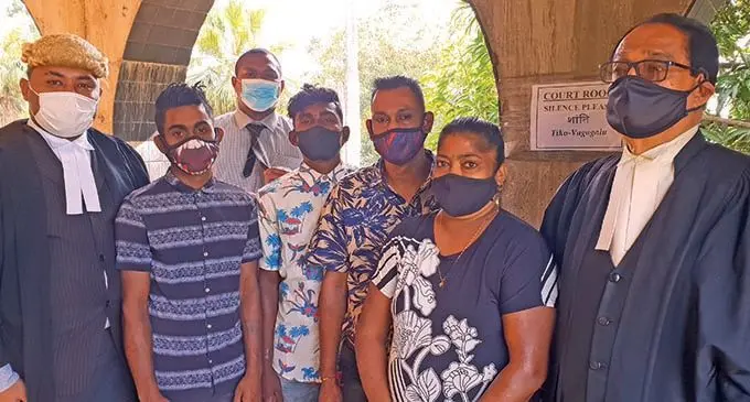 From left: Associate, Tevita Vakaloloma, Mohammed Shafim Khan, Seremaia Koroi, Muni Vishal Nair, Shailendra Prasad, Sarojani Prasad and defence counsel, Iqbal Khan at the High Court in Lautoka on October 21, 2021.