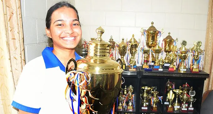 Mahatma Gandhi Memorial High School  DUX  Ashley Chand with her trophy following their year 13 graduation on December 3, 2020. Photo: Ronald Kumar.